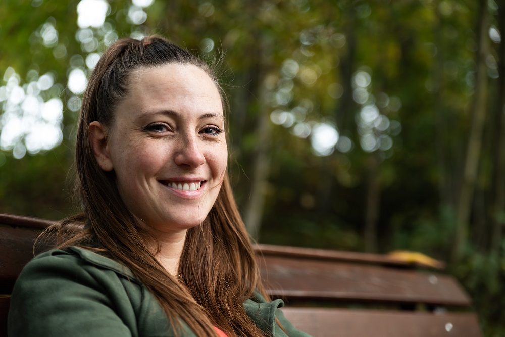 Caucasian woman smiling outdoors